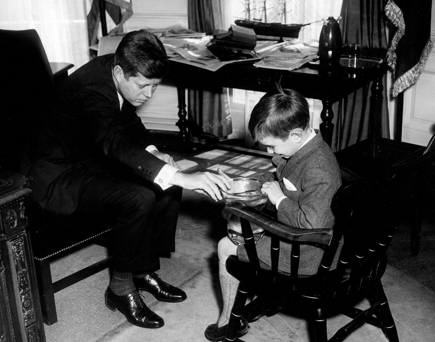 President John F. Kennedy in the Oval Office with his young nephew Robert F. Kennedy Jr. in 1961